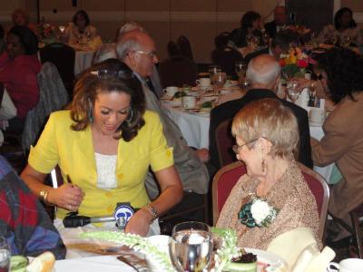 Lisa Thomas-Laury of Channel 6 News conducts an interview with Mae Verga,99, at the 2013 Delaware County Centenarian Luncheon.