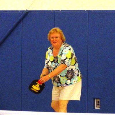 Karen Bachmann, of Havertown, prepares to serve.