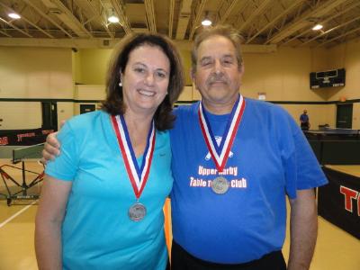 Maryann Sterin, of Garnet Valley, with Alan Kutner, of Havertown show off their Table Tennis medals.
