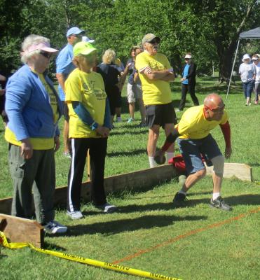 Johnny Walker takes his turn at Bocce.