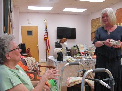 Storytelling with Roz Benton-
Care receivers reminisce using Octagon soap years ago during Storytelling presentation of The World.