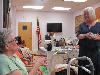 Storytelling with Roz Benton-
Care receivers reminisce using Octagon soap years ago during Storytelling presentation of The World.