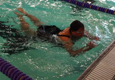 Janet Dennis competes in Swimming at Upper Darby High School.