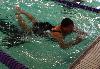 Janet Dennis competes in Swimming at Upper Darby High School.