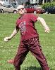 Tom Rice hurls the softball in Track and Field's softball throw.