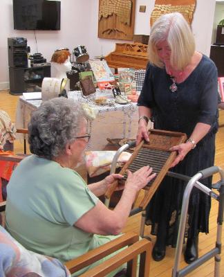 Storytelling with Roz Benton-
explaining how each side of a washboard was different to accommodate different fabrics