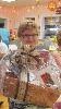 Raffle winner displays her prize at the dinner on the final night of the Caregiver Academy. 