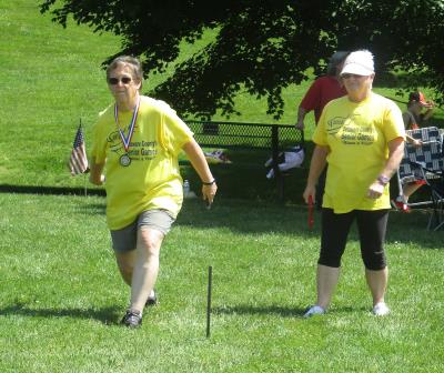 Nadine Atkinson, 63, of Springfield takes the throw.