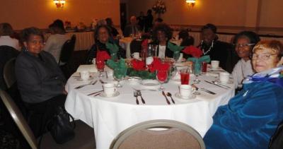 Foster Grandparents enjoy the luncheon. 