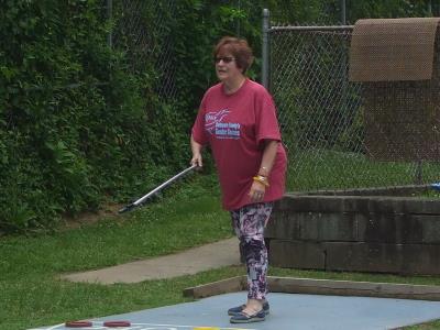 Elizabeth Hermansen competes in Shuffleboard at Ridley Township Swim Club