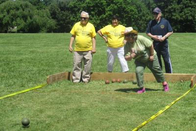 Linda Desiderio gives Bocce a try.