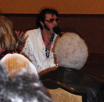 Elvis entertains the crowd, courtesy of Heron Companions.