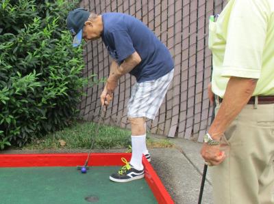 John Krok goes for the putt!