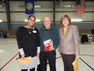 Frank Albertini, of Brookhaven, (center) displays the window insulation kit that will help him winterize his home this winter. Mr. Albertini won the kit at the Energy Fair held on November 14. Prizes included Lowe's gift cards which can be used toward home repairs or weatherization. Also pictured are: Christy Bobo (left), Director of Housing at COSA and Joanna Geiger (right), ADRC Coordinator. 