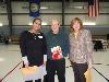 Frank Albertini, of Brookhaven, (center) displays the window insulation kit that will help him winterize his home this winter. Mr. Albertini won the kit at the Energy Fair held on November 14. Prizes included Lowe's gift cards which can be used toward home repairs or weatherization. Also pictured are: Christy Bobo (left), Director of Housing at COSA and Joanna Geiger (right), ADRC Coordinator. 