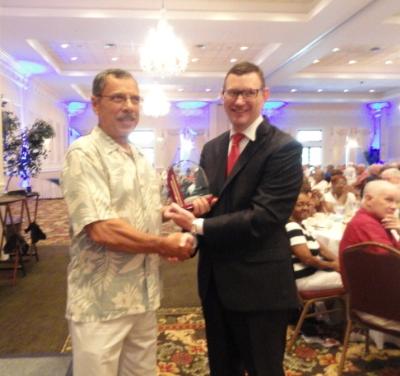 Fit for Life winner, John Iannotti, is presented his award by Stephen Gamble, co-chair of the Delaware County Senior Games.