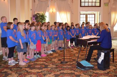 The Worrall Elementary School choir entertains the guests. 