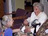 Director, Marjorie Shoemaker, introduces a rabbit named Fenwick to Eleanor Miller.