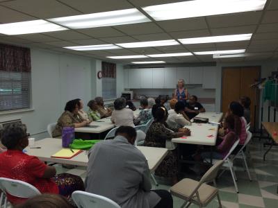 Dr. Cheryl Macklin leads a discussion on relaxation techniques at the final session of the Caregiver Academy 2015 Spring Series.