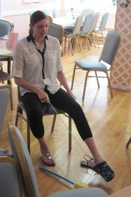Occupational therapist, Rachel Wiley, demonstrates adaptive devices.