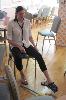 Occupational therapist, Rachel Wiley, demonstrates adaptive devices.