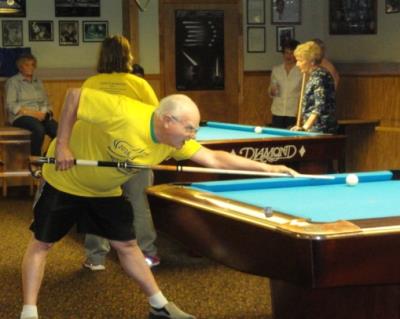 Stan Smith, 67, of Prospect Park, lines up a shot.