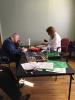 Care recipients, Gerald Struble and Teddy Cozan, participate in a brain stimulation exercise.