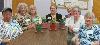 Care receivers participate in a horticulture activity.