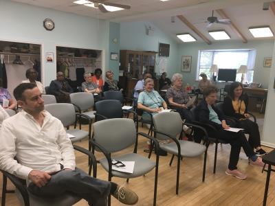 Caregivers listen to presenter, Sharon White, discuss developing support systems.	